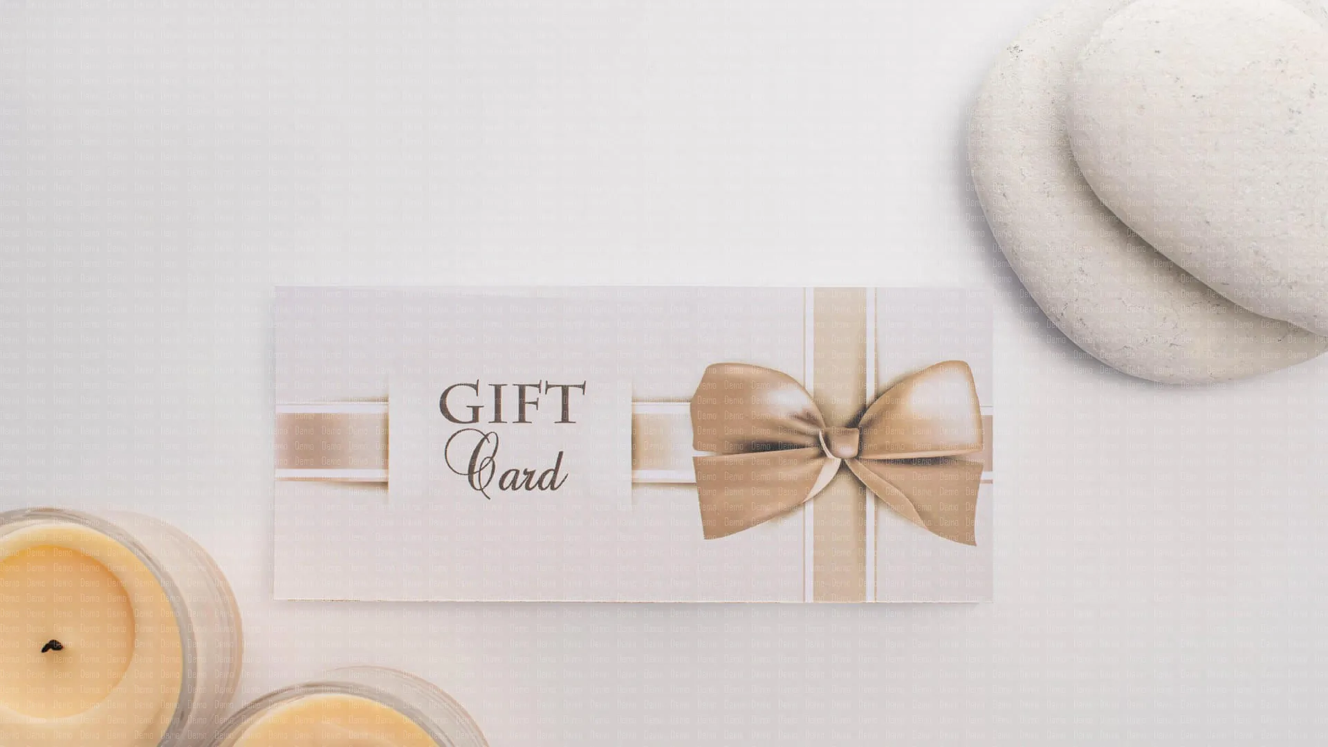 top-view-of-gift-card-near-candles-and-zen-stones-2023-11-27-04-57-49-utc